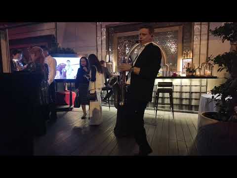 Smooth jazz saxophone performance inspired by George Benson vibes, recorded live during a corporate event at Hutong DIFC Dubai.