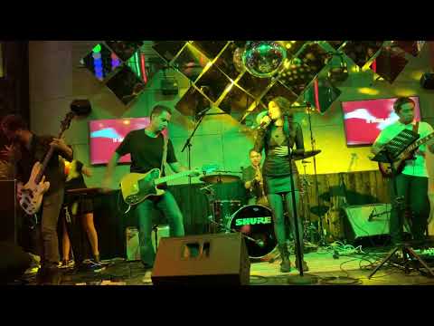 Guitarist in full band performance (2)