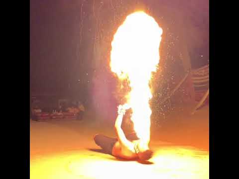 Slow motion firebreathing with Poi