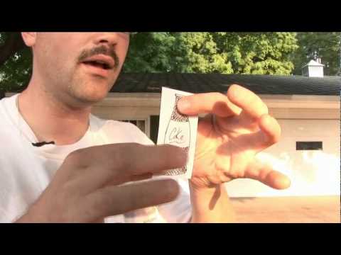 Joe performing his original illusion, "Fizz Bubble".
