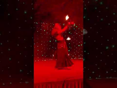 Tribal fusion dance with fire performance at Coutry side resort. Rajasthan, India. December 2021