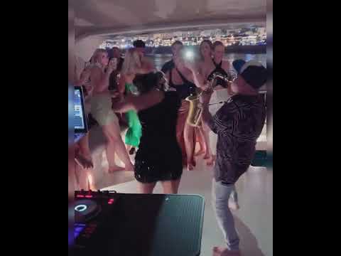 yact party playing with a DJ